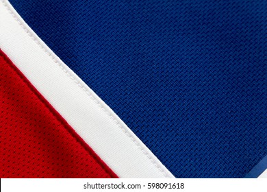 Red, White And Blue Polyester Fabric Of A Hockey Jersey, Close Up