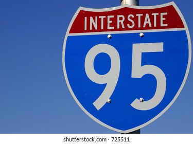 Red, White And Blue Sign Directing Travelers Toward Interstate 95 In Central Florida, USA