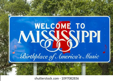 Red, white, and blue sign to welcome travelers to Mississippi - Birthplace of America's Music at Chef Menteur Highway