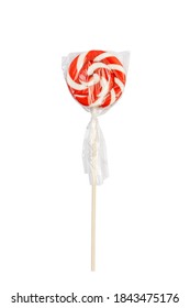 Red And White Caramel Lollipop Twisted In A Spiral Wrapped In A Transparent Cellophane Wrap. Isolated On White.