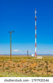 Red And White Cell Phone Tower In The Countryside Of South Africa