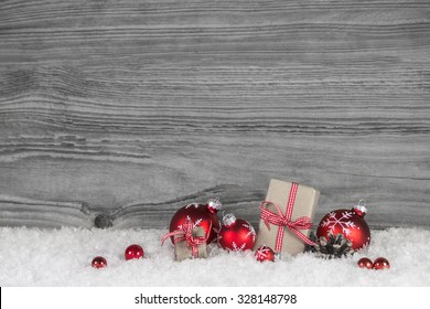 Red White Checked Christmas Presents On Old Grey Wooden Background For A Gift Certificate.