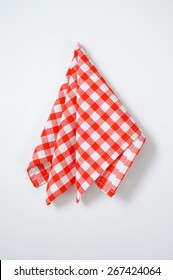 Red And White Checkered Napkin On White Background