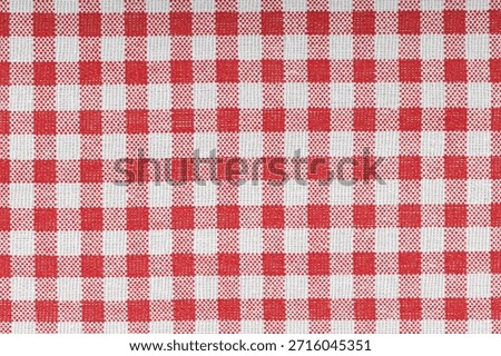 Red and white checkered, pattern, design, cotton fabric for sewing, texture background close-up