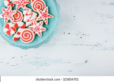 Red And White Christmas Cookies On A Plate