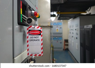 Red, white Lock out & Tag out for Lock station,machine - specific or switch gear roomd evices and safety first point, Cyber security or safety industrial concept.                      