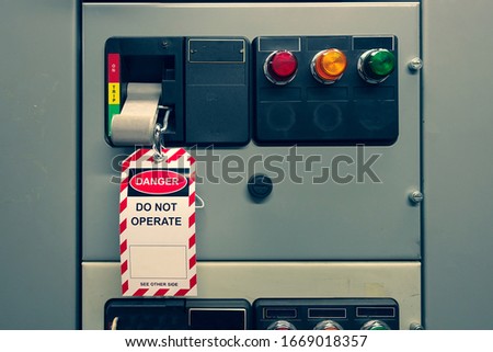 Red, white Lock out & Tag out for Lock station,machine - specific or switch gear roomd evices and safety first point, Cyber security or safety industrial concept.                      