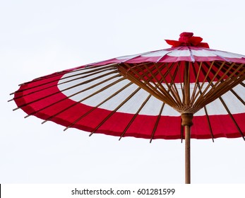 Red and white paper Japanese traditional wooden umbrella