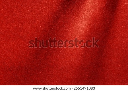A red and white patterned background with red dots covering it. The red background is the main focus of the image, while the white dots add a contrasting element to the scene