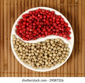 Red And White Pepper In A Ying Yang Bowl