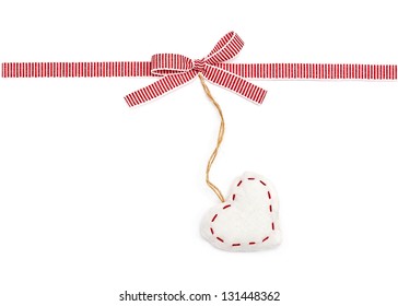 Red The White Ribbon In A Strip, A Bow And The Heart, Isolated On White Background