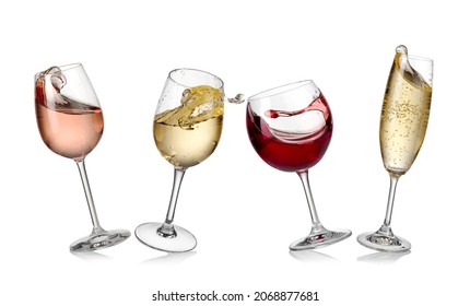 Red, white and rose wine glasses and one champagne glass dancing and plash on white background