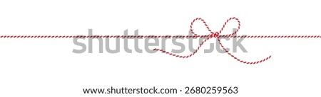 Red and White String Rope with Bow Isolated on White Background. Clipping Path Included