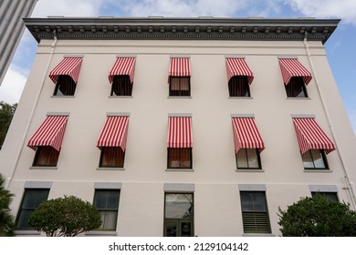 Red and white striped awnings at the Florida State Capitol Building