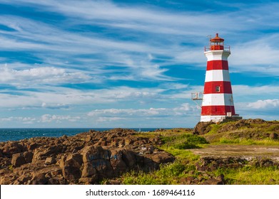 Red And White Striped Lighthouse