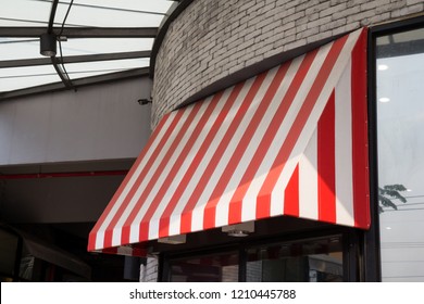 Red And White Striped Shop Awning.