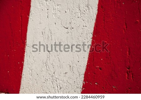 Red white stripes park stop marking abstract warning sign textured background
