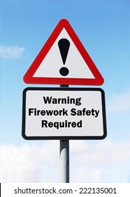 Red And White Triangular Warning Road Sign With A Warning Of Firework Safety Required Concept Against A Partly Cloudy Sky Background