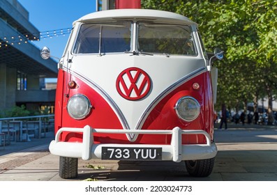 Red And White Volkswagen Beatle Van On A Sunny Day.  London - 17th September 2022