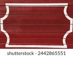 red and white wooden barrier of a bullring