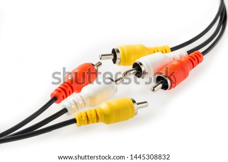 Red, white, yellow RCA plug with black cable connect to audio and video isolated on white background, close up