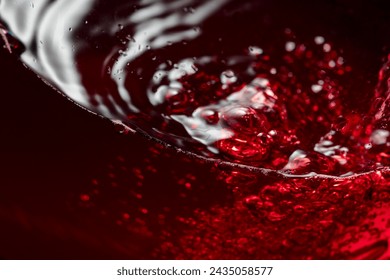 Red wine abstract splashing in glass. Macro shot. Copy space. - Powered by Shutterstock