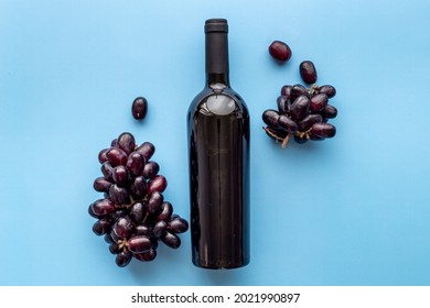 Red Wine Bottle With Grape. Overhead View