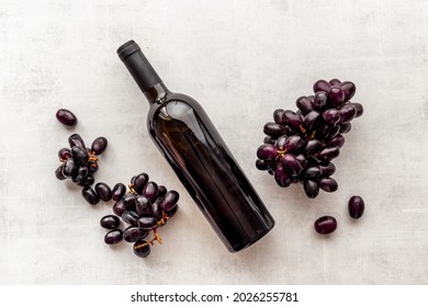 Red Wine Bottle With Grape. Overhead View