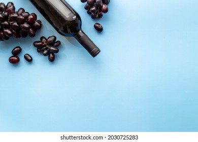 Red Wine Bottle With Grape. Overhead View