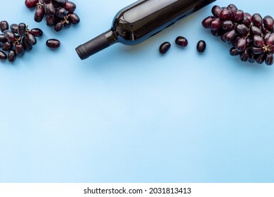 Red Wine Bottle With Grape. Overhead View