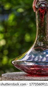 Red wine breaks out of the bottle and immediatly slows down in the neck of the decanter. When it reaches the bottom of the decanter, it finally can breathe and develop its full aroma. Delicious.