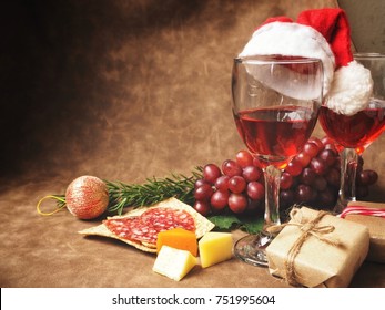 Red Wine With Cheese Sausages And Christmas Hat