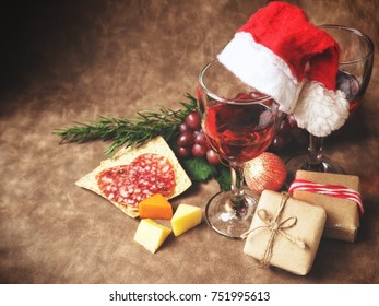 Red Wine With Cheese Sausages And Christmas Hat