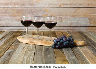 Red Wine Flight With Grapes