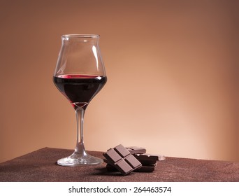 Red wine glass and chocolate