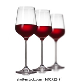 Red Wine In Glasses Isolated On White