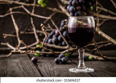 Red Wine With Grapes. Fresh Grapes On Wood. Autumn Fruit