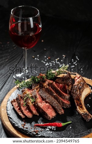 Red wine and grilled meat. Restaurant menu, dieting, cookbook recipe top view.