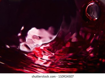 Red Wine On A Black Background, Abstract Splashing.