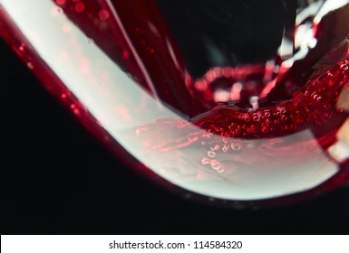 Red Wine On A Black Background, Abstract Splashing.