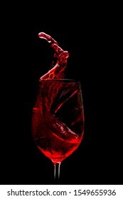 Red Wine On A Black Background.