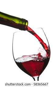 Red Wine Pouring Into Glass Isolated