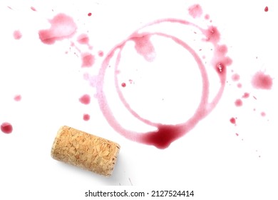 Red Wine Rings, Drops And Cork On White Background, Top View