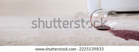 Red Wine Spill Stain On Carpet. Spillage Damage