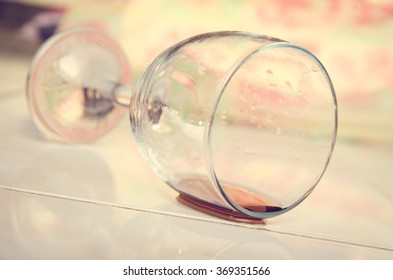 Red wine spilled from glass over 