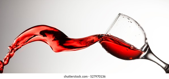 Red wine splash on the white background