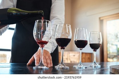 Red Wine Tasting With Luxury, Quality Alcohol In Glasses For Fine Dining Food, Culinary Or Hospitality Industry. Sommelier Service Or Serving Vintage Alcoholic Drink At A Classic Classy Restaurant