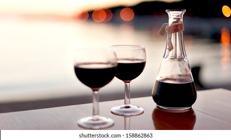 Red Wine For Two In Sunset