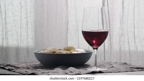 Red Wine In Wineglass With Pasta On Background, Wide Photo