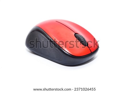 Red wireless computer mouse isolated on white background